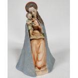 A Hummel pottery figure of a Madonna and Infant Jesus, decorated with polychrome enamels, (h 23cm