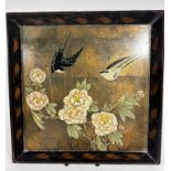 A Japanese square lacquered tray with flared edge, decorated with chrysanthemums and swallows,