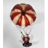 A composition novelty Clown parachuting figure (40cm x d.29cm)