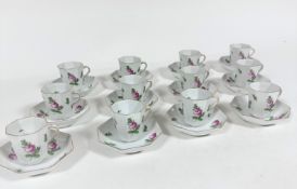 A set of twelve Hungarian Herend porcelain octagonal tapered chocolate cups with S scroll handle