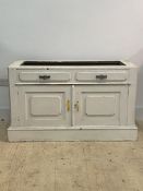An Edwardian painted side cabinet, fitted with drawer and twin panelled cupboards, skirted base,