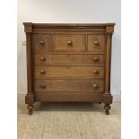 A large 19th century Scottish mahogany chest, with concealed frieze drawer over three short and