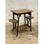 An Edwardian mahogany occasional table, the top with moulded edge decorated with similated floral
