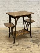 An Edwardian mahogany occasional table, the top with moulded edge decorated with similated floral