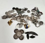 A collection of silver thruppenny coin and sixpence jewellery including two bracelets with George
