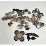 A collection of silver thruppenny coin and sixpence jewellery including two bracelets with George