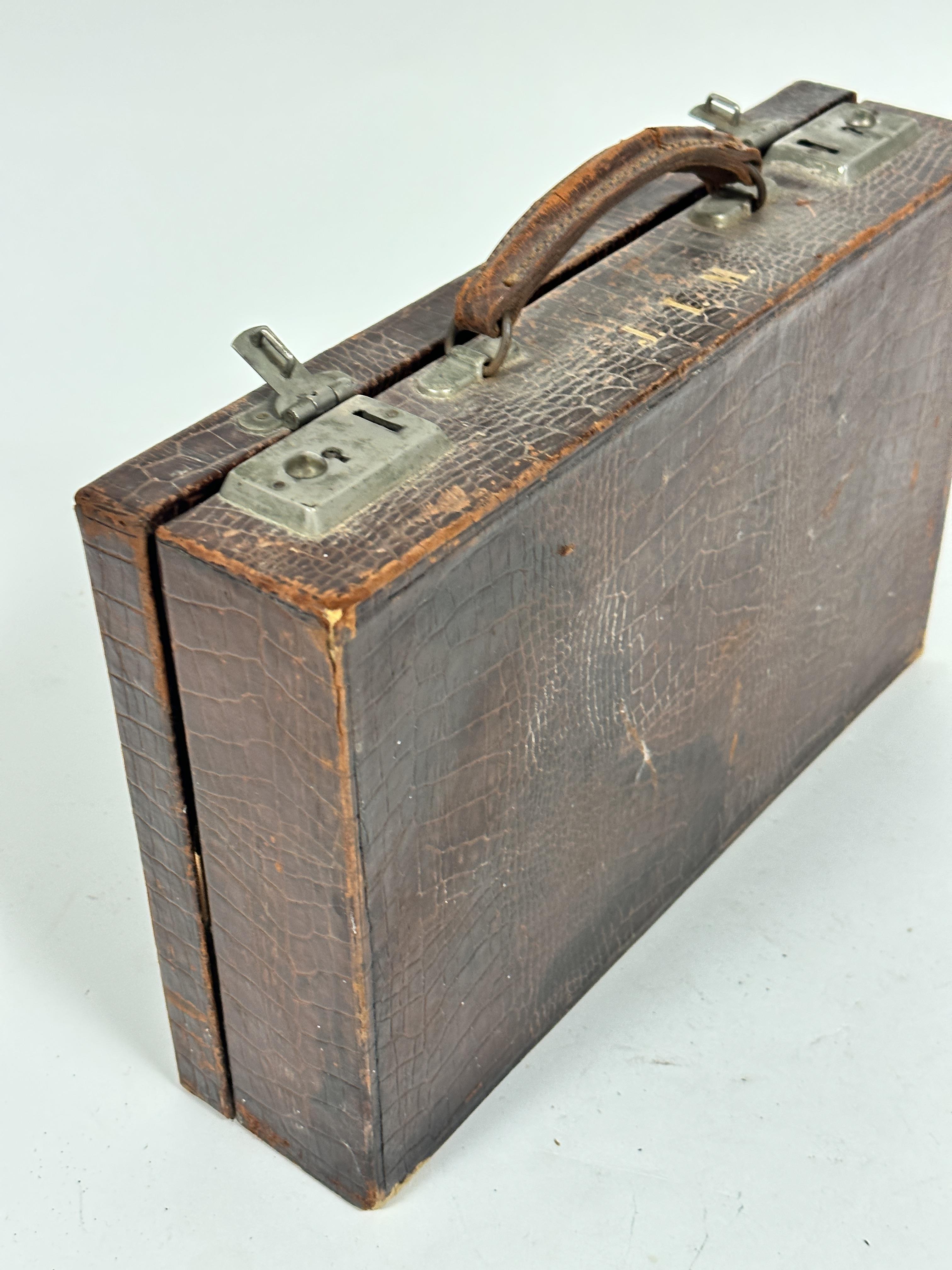 A vintage embossed leather writing case, c.1900, with part fitted interior, complete with blotter, - Image 3 of 5