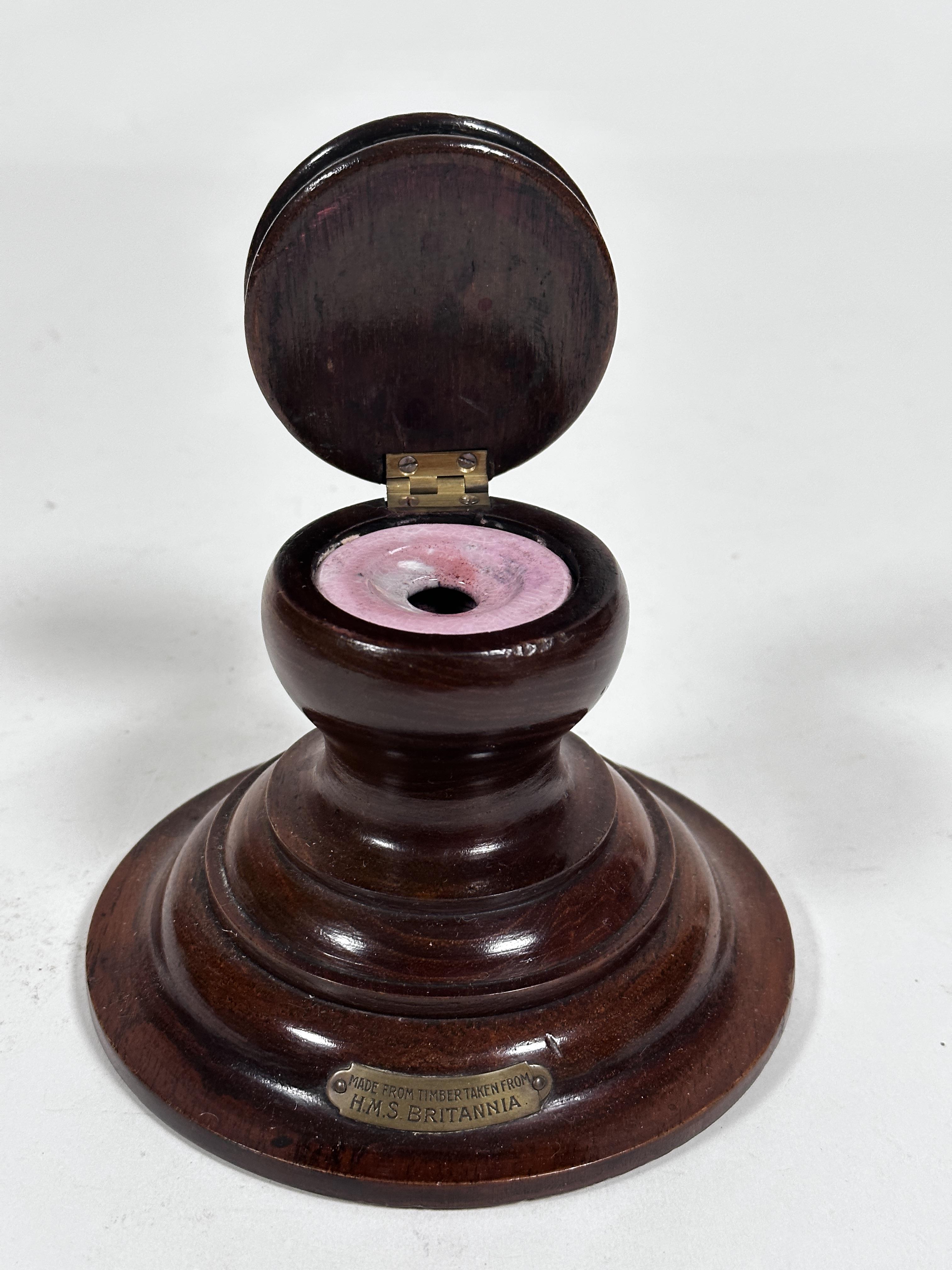 An Edwardian mahogany Capstan style inkwell, made from the timbers taken from HMS Britannia, with - Image 2 of 4