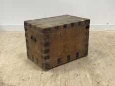 A 19th century pine and metal bound coffer with carry handle to each end and plain interior,