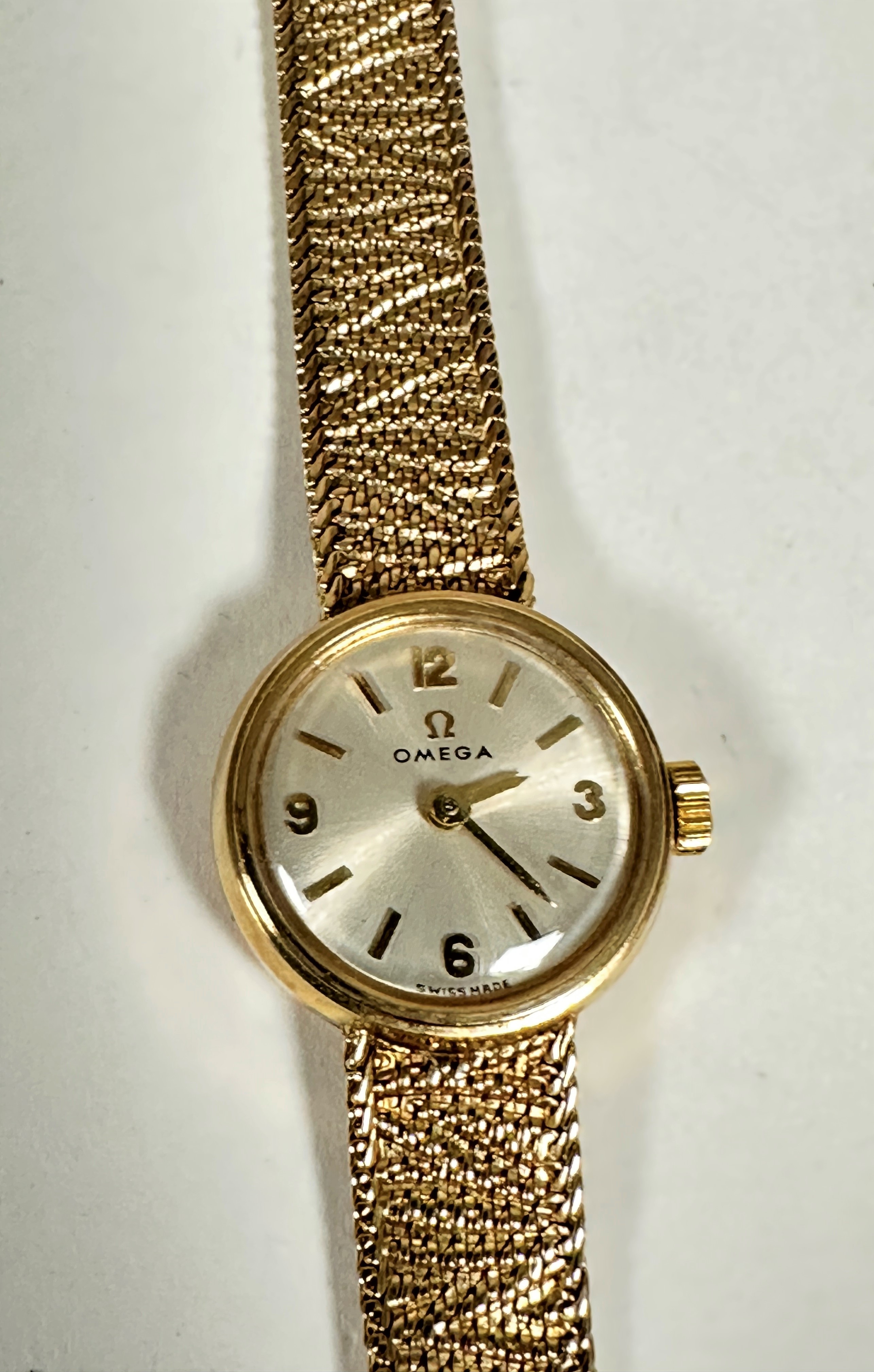 A lady's Omega 9ct gold wristwatch with silver dial and Arabic quarter hour markers and batons, (d - Image 2 of 2