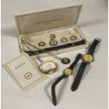A box containing a lady's Heno Swiss interchangeable watch pendant complete with extra straps, cases