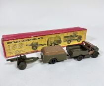 A Britains clockwork set of Beetle Lorry with driver, mechanical clockwork trailer and 25 pounder