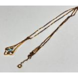 An Edwardian 9ct gold open work leaf shaped pendant set circular aquamarine, stone approx .25ct,
