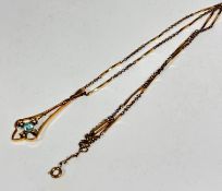 An Edwardian 9ct gold open work leaf shaped pendant set circular aquamarine, stone approx .25ct,