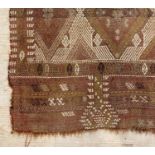 An Antique Soumak flatweave rug, with lozenge motif and bordered 135cm x 123cm