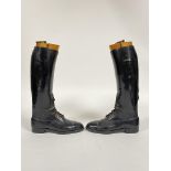 A pair of black leather riding boots with lasts, heal to toe L29.5cm