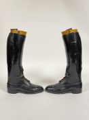 A pair of black leather riding boots with lasts, heal to toe L29.5cm