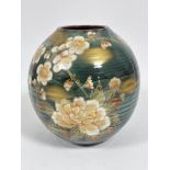 A Japanese ovoid ribbed vase with stylised chrysanthemum and gilt design (30cm x d.26cm), signed