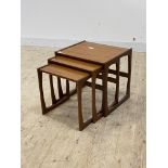 A mid century teak nest of three tables, H49cm, W53cm, D43cm