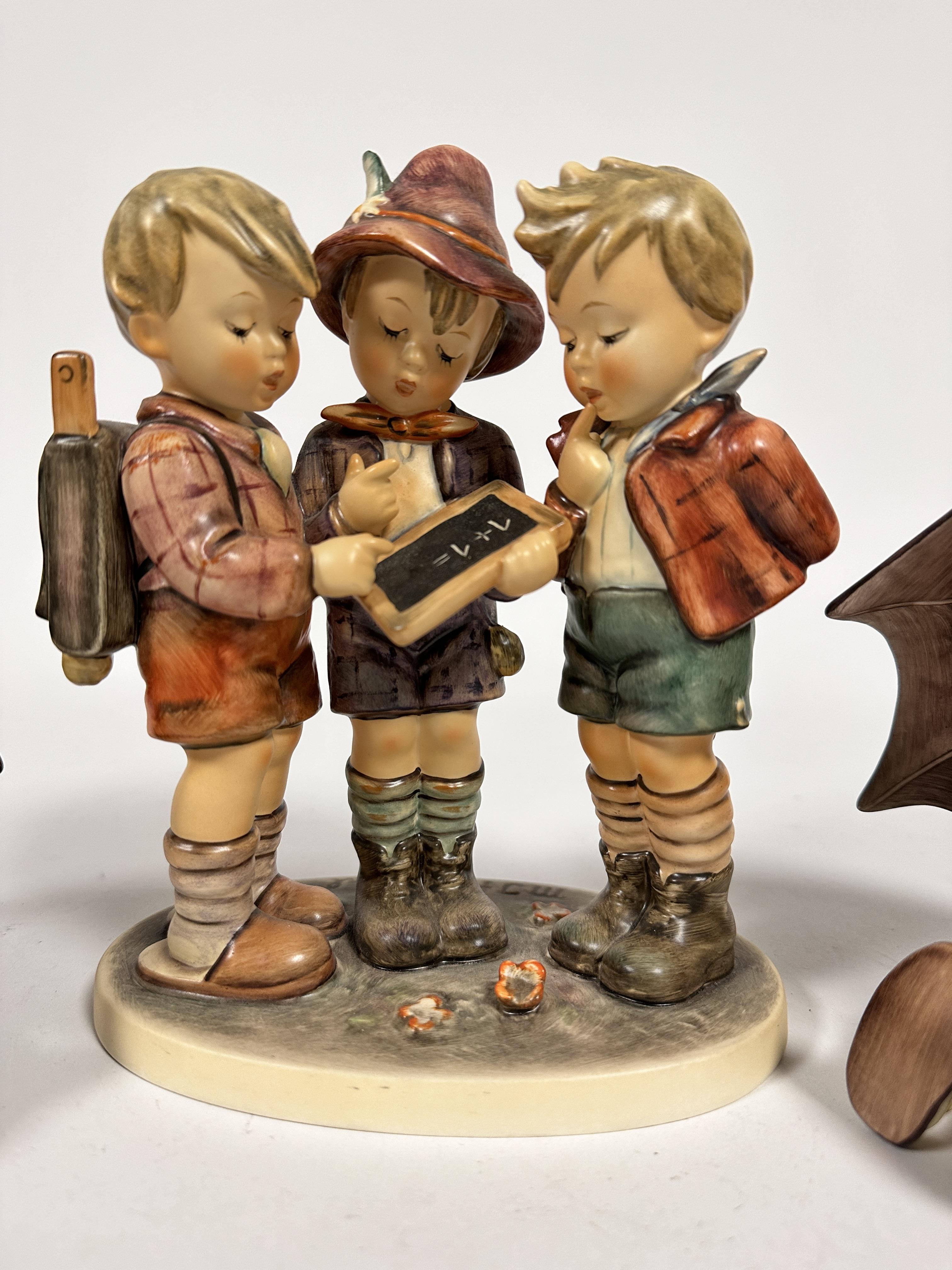 A Hummel pottery figure group School Boys, (20cm x 15cm x 9cm) and a pair of Hummel pottery figures, - Image 2 of 4