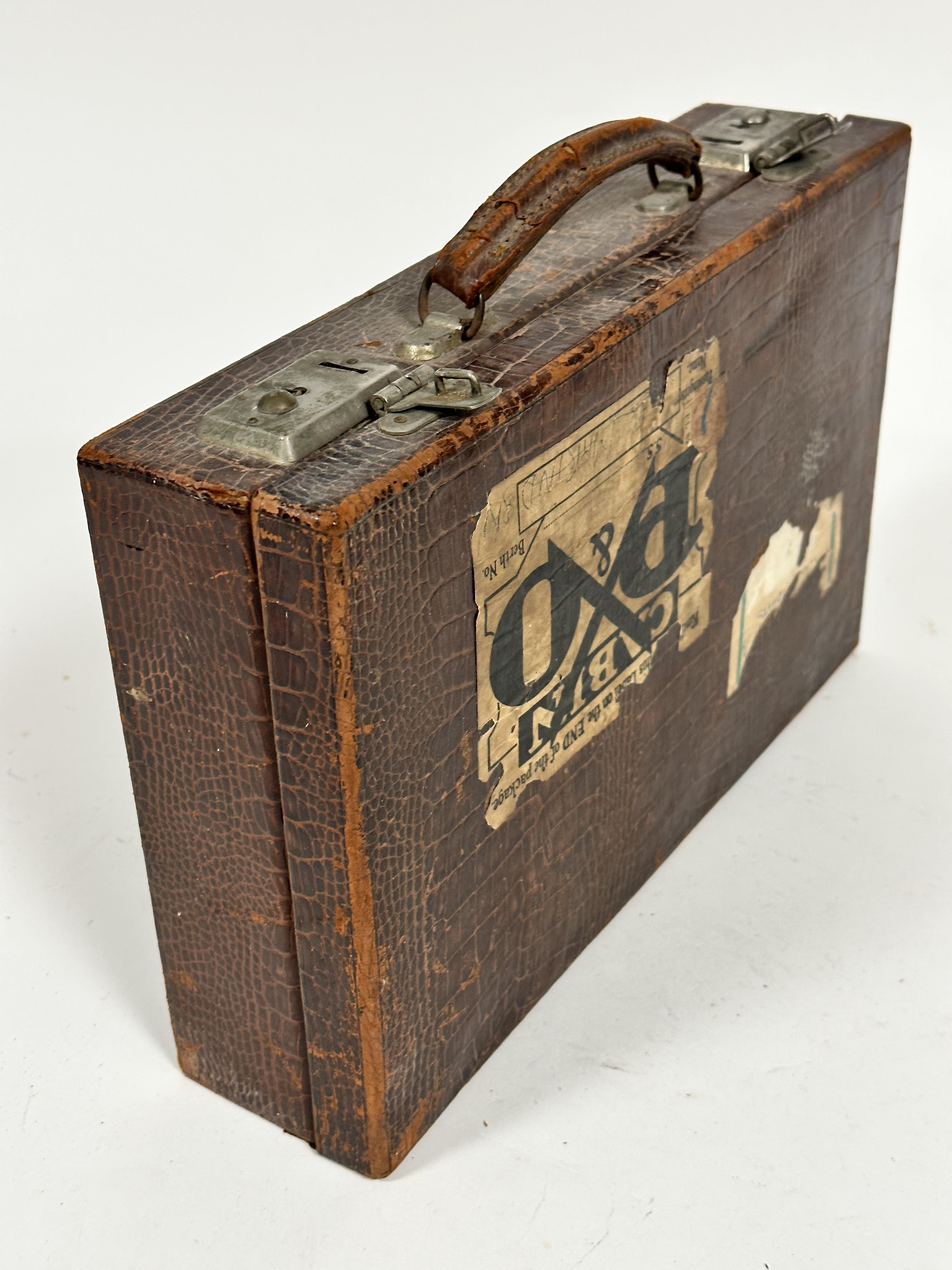 A vintage embossed leather writing case, c.1900, with part fitted interior, complete with blotter, - Image 4 of 5