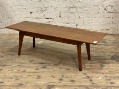 A mid century teak coffee table, the rectangular top with chamfered edge H38cm, 122cm x 40cm