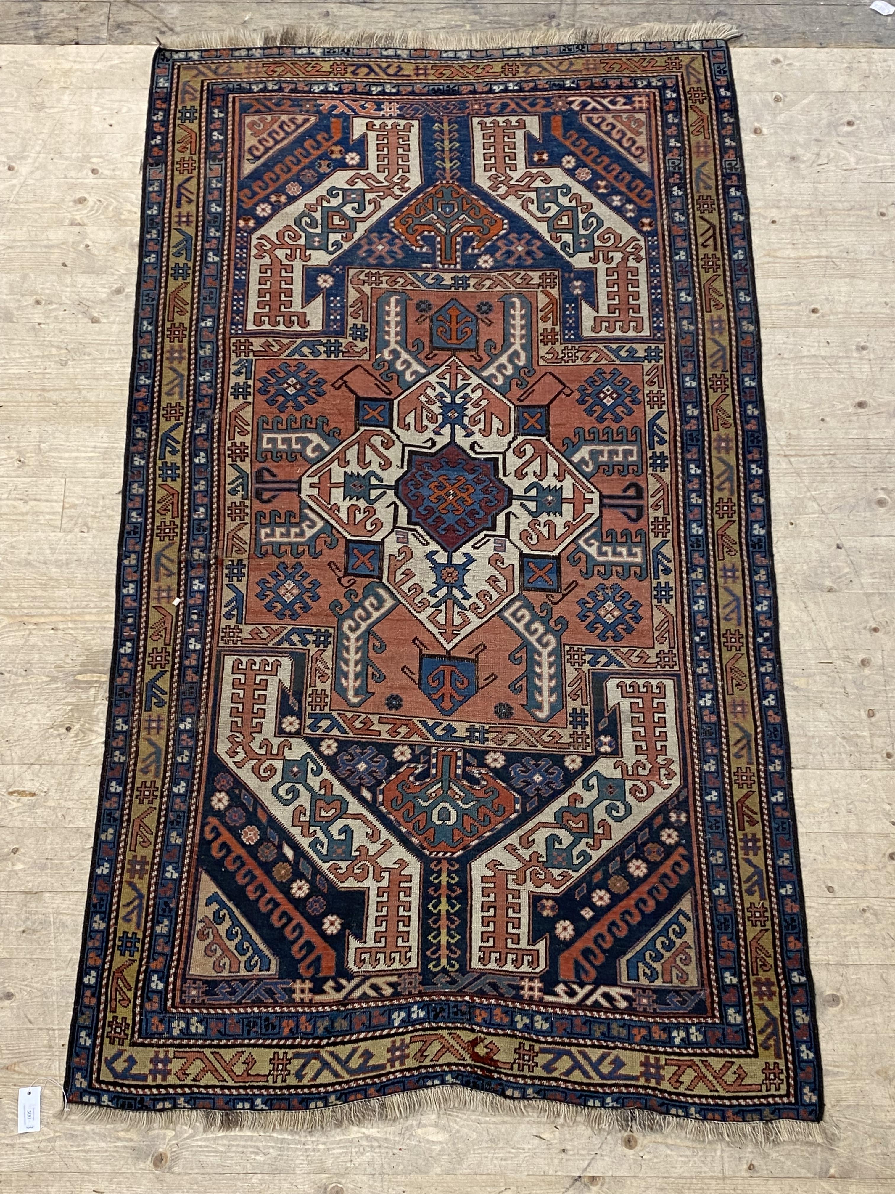 A hand woven Caucasian rug of geometric design with multi line border, 223cm x 124cm - Image 2 of 3