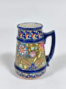 A Fischer of Budapest, patent tankard decorated with traditional Hungarian lattice border to top and