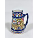 A Fischer of Budapest, patent tankard decorated with traditional Hungarian lattice border to top and