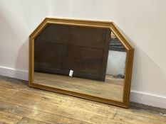 A gilt framed over mantel mirror of hexagonal outline, with bevelled plate and Jenners retail