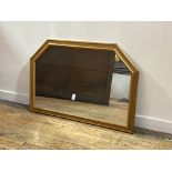 A gilt framed over mantel mirror of hexagonal outline, with bevelled plate and Jenners retail