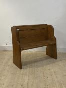 A pitch pine pew or hall bench, with panelled back H82cm, W100cm D38cm