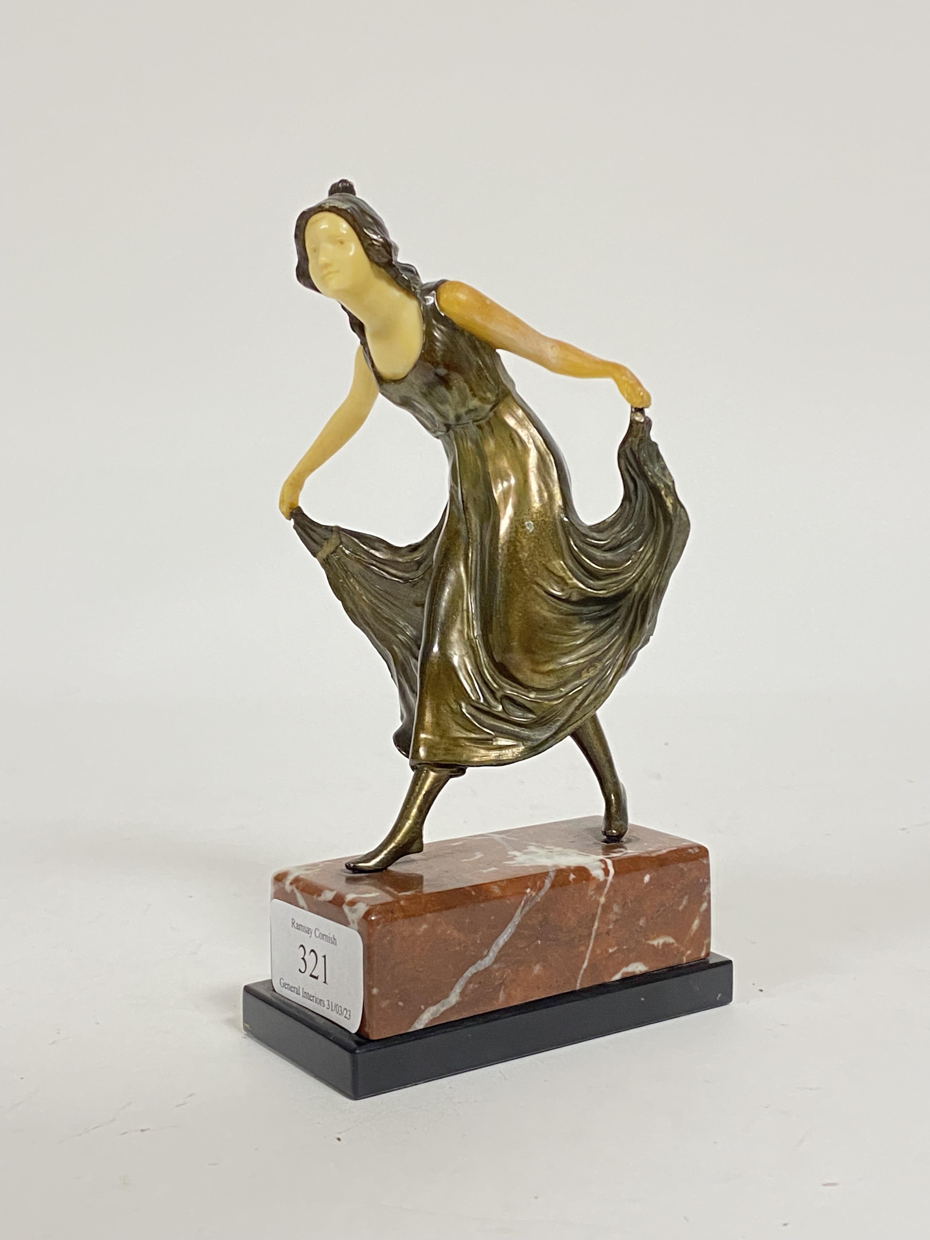 After Ferdinand Preiss, an Art Deco style bronzed spelter and resin statue modelled as a dancer,