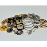 A collection of costume jewellery including a silver lattice band bracelet, (d 7cm)a plain silver