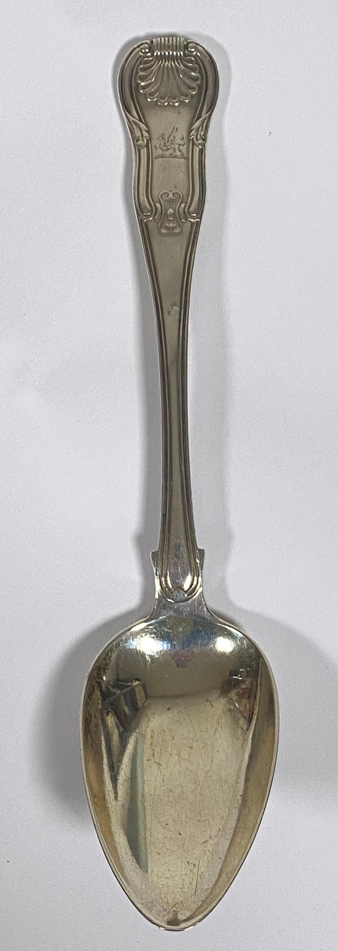 An Irish Dublin 1818 silver Fiddle, Shell and Thread pattern table spoon with engraved griffin