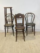 A matched set of four early 20th century bentwood chairs, together with a bentwood stool (H70cm)