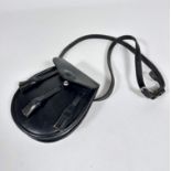 A black leather handmade sporran with black leather strap and three tassels (20cm x 18cm),