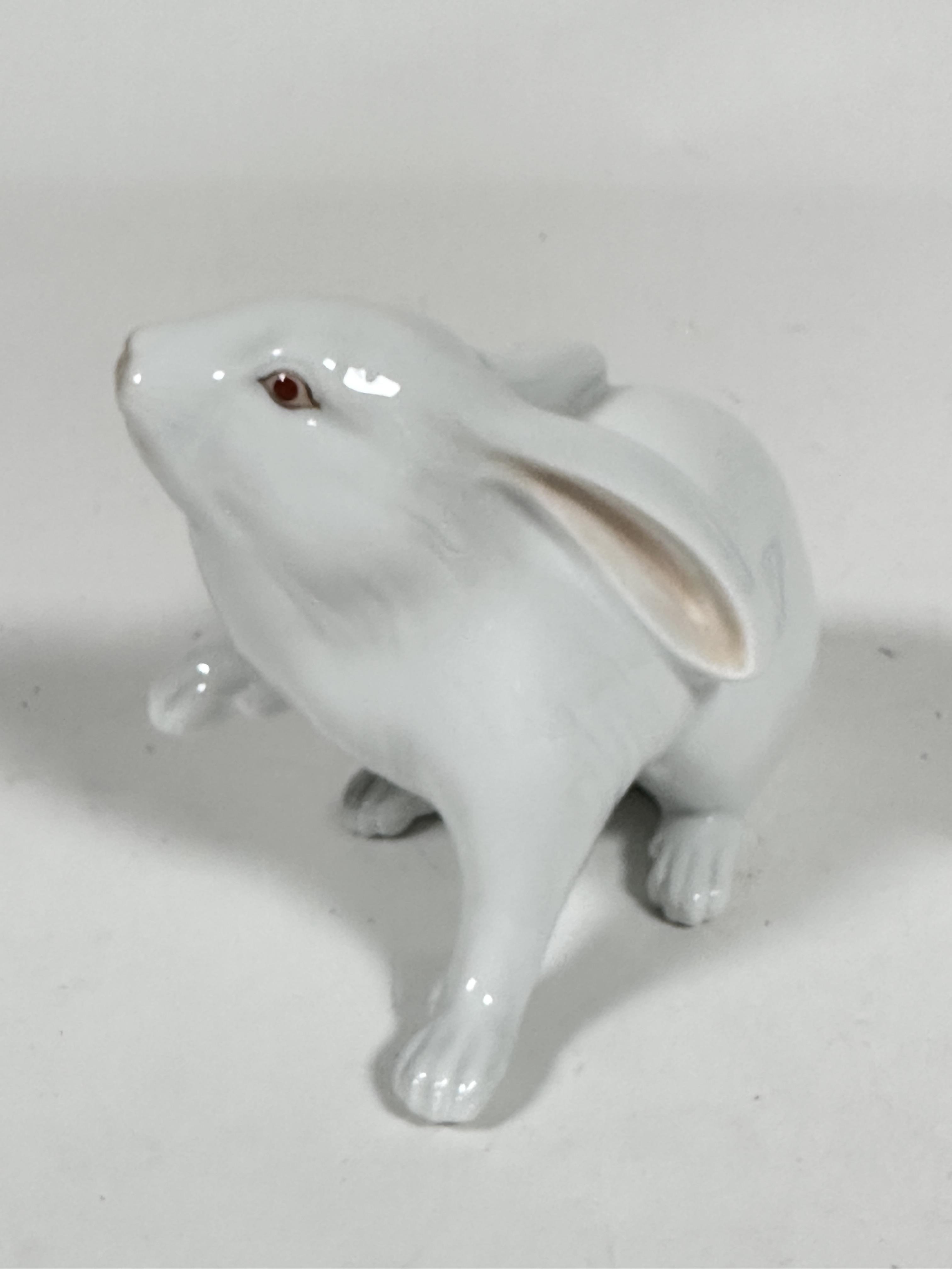 A Herend porcelain model of a white Rabbit, with raised paw, decorated with polychrome enamels (10cm - Image 2 of 3