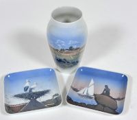 A Danish Royal Copenhagen baluster vase decorated with landscape scene with farm and cloudy sky, (