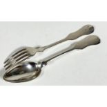 A pair of Continental white metal fiddle pattern table fork and table spoon, (L: 22cm) hallmarked to