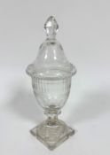 A 19thc crystal urn shaped engraved sweetmeat dish with domed engraved and thumb cut top with