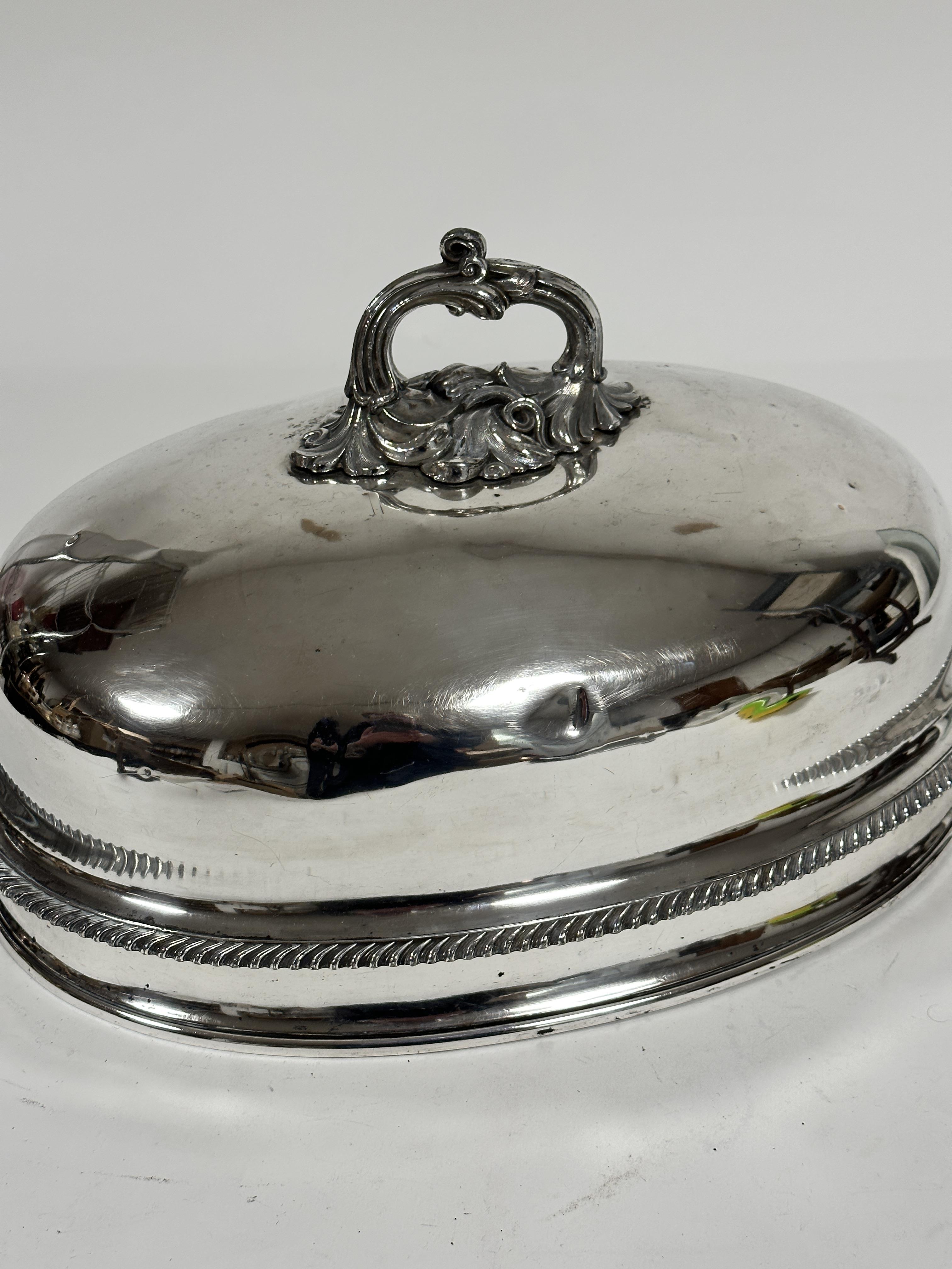 A 19thc oval meat dish cover with scroll handle to top and crest with motto FFYDDLAWN BEUNYDD, - Image 4 of 6