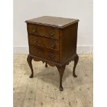 A mid 20th century mahogany bedside chest of George II design, the cross banded top three drawers,