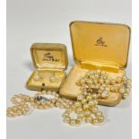 Vintage:- A pair of yellow metal mounted screw in paste pearl stud earrings and a paste pearl two