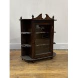 A glazed mahogany wall cabinet, H59cm