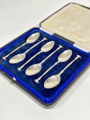 A set of six Birmingham 1931 silver seal handled coffee spoons with oval bowls, (L: 11cm) complete