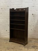 An early 20th century stained hardwood open bookcase fitted with five adjustable shelves H147cm,