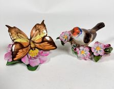 A Hungarian Herend porcelain chaffinch figure mounted on floral branch, shows no signs of chips,