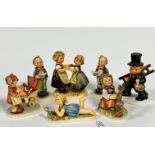 A collection of Hummel pottery including Miss Behaving, Limited Edition recumbent figure, Spring