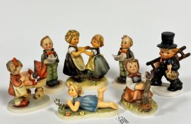 A collection of Hummel pottery including Miss Behaving, Limited Edition recumbent figure, Spring